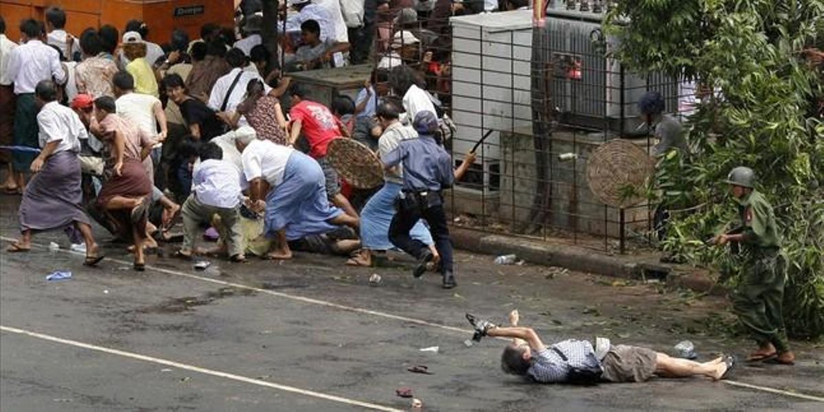 Kenji Nagai of APF lies dying after police and military officials fired on him in Yangon in this September 27, 2007.