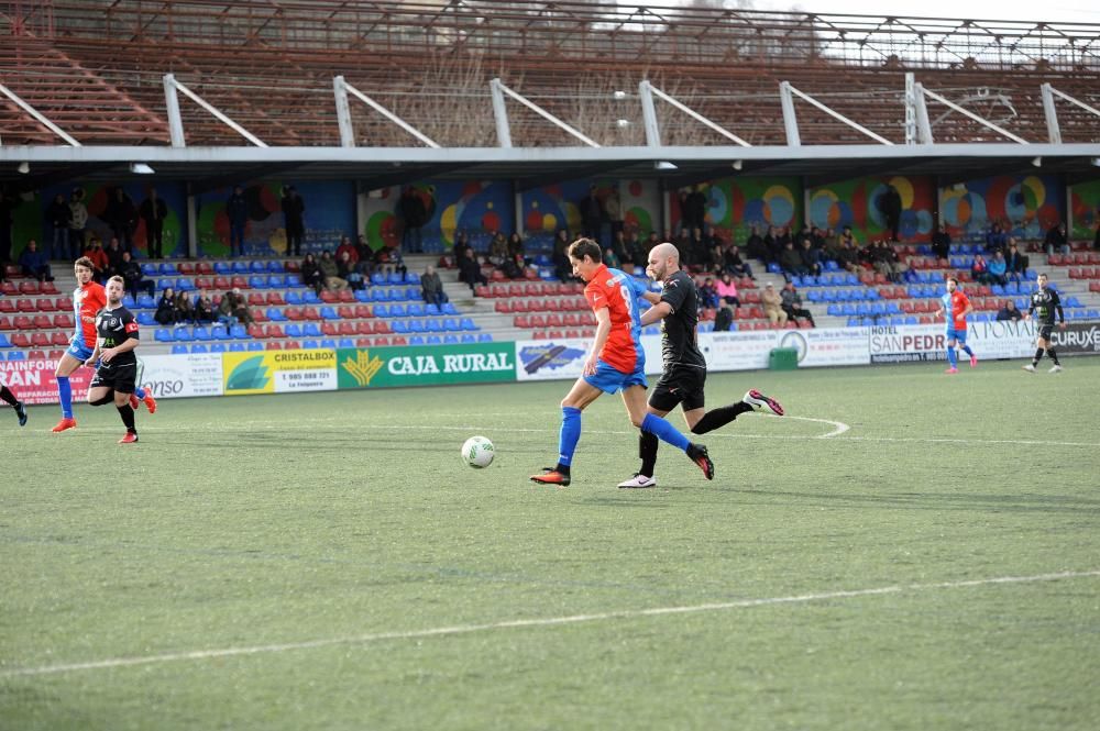 El partido entre el Langreo y el Siero, en imágenes