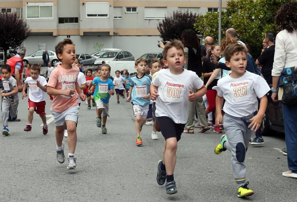 Cientos de niños y niñas participaron hoy en el Maratón Infantil Interescolar que se ha celebrado en el entorno de la gasolinera de Coia esta mañana
