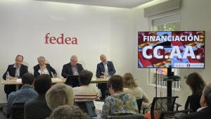 Los economistas José María Durán, Valentí Pich, Ángel de la Fuente, Diego Martínez-López en la sesión sobre financiación autonómica.