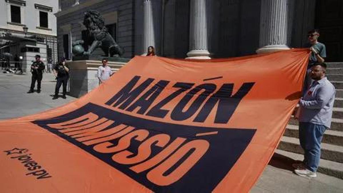 Pancarta en el Congreso.
