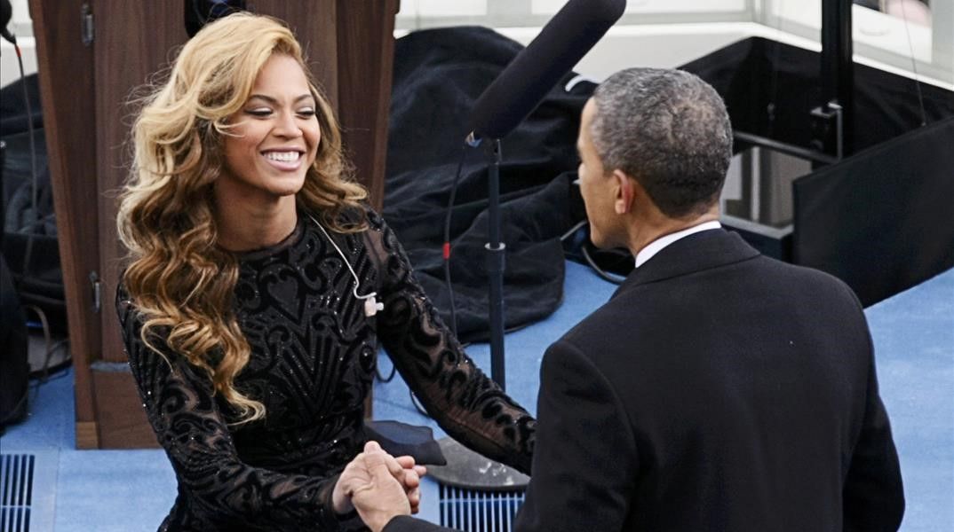 Singer  Beyonce is greeted by U S  President Barack Obama after her performance during inauguration ceremonies in Washington  January 21  2013   REUTERS Rick Wilking (UNITED STATES  - Tags  POLITICS ENTERTAINMENT)