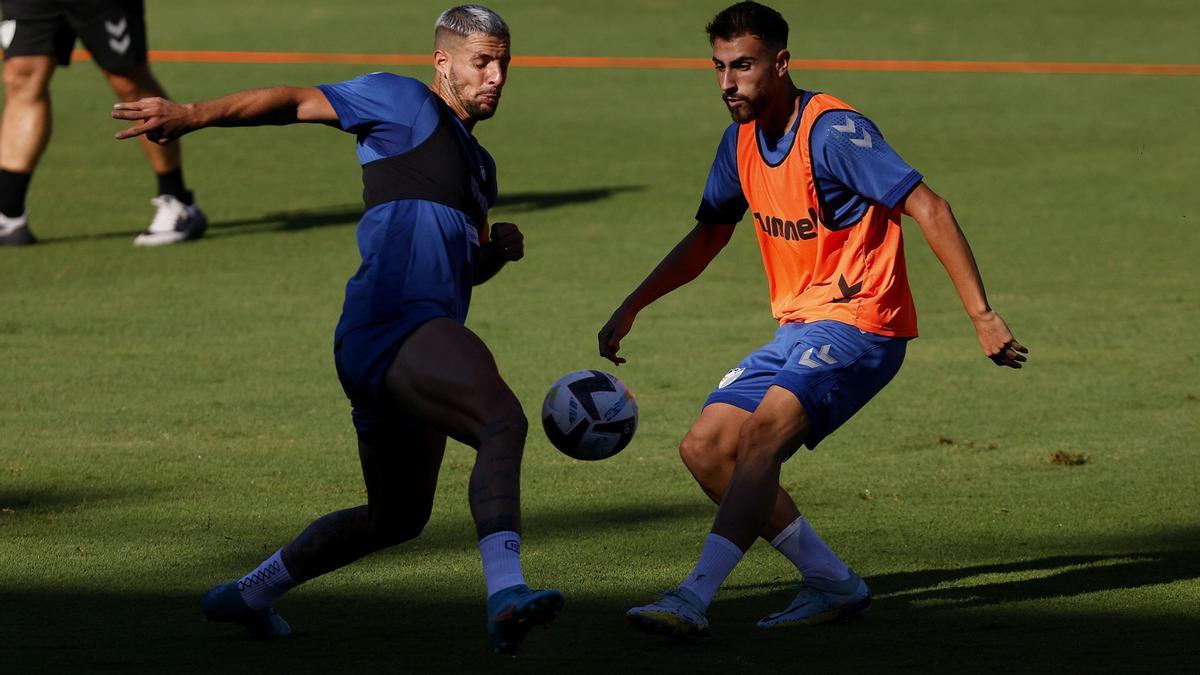 Luis Muñoz y Fran Sol, durante el entrenamiento.