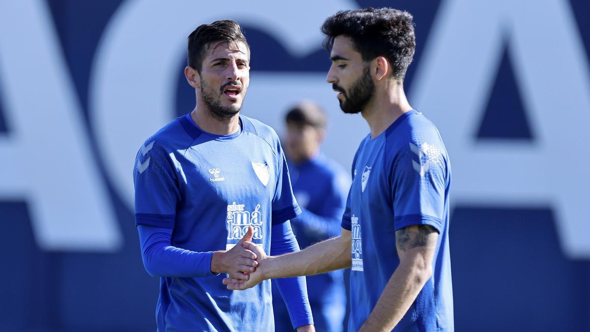 Juande y Chavarría, durante un entrenamiento.