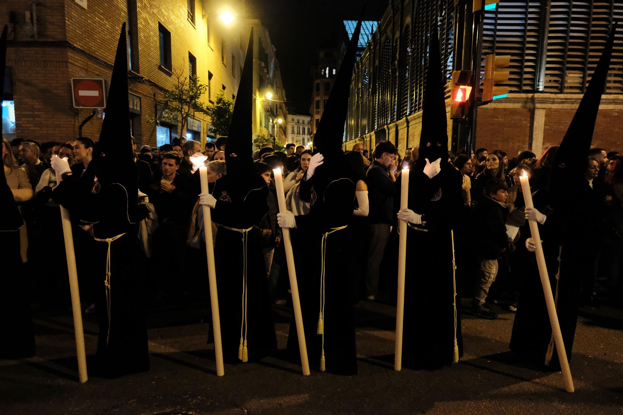 Salida procesional de la Congregación de Mena, en el Jueves Santo de Málaga.