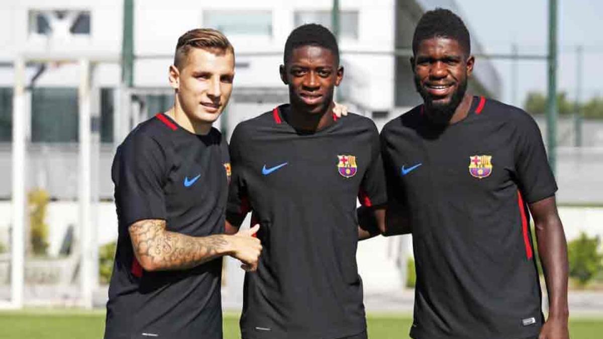 Dembélé, junto a Digne y Umtiti