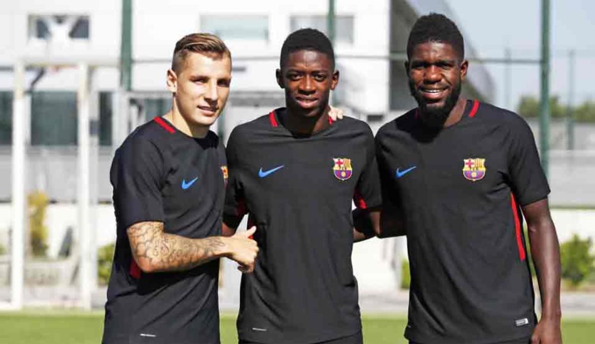 Dembélé, junto a Digne y Umtiti