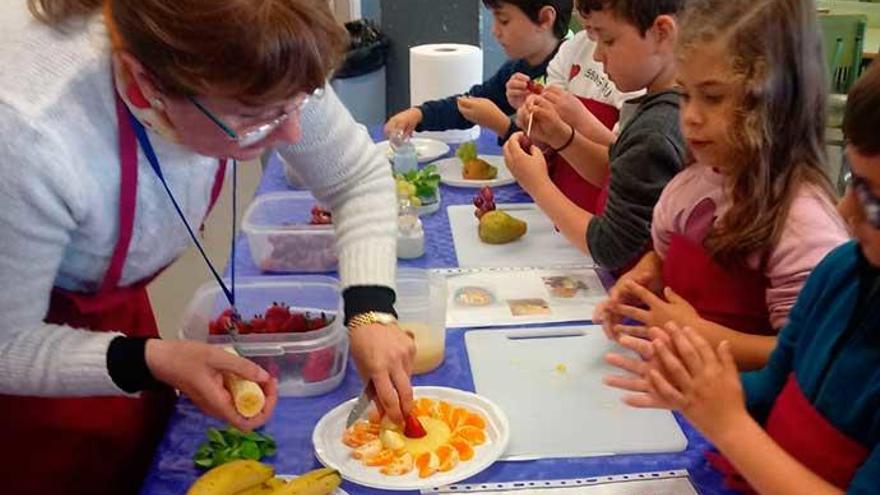 Actividad de escolares y alumnos de A Escada.