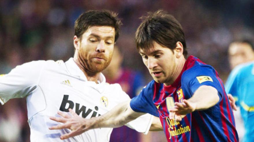 Messi y Xabi Alonso.