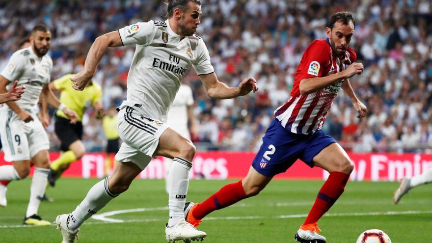 Madrid y Atlético empatan en el derbi y la Liga se aprieta