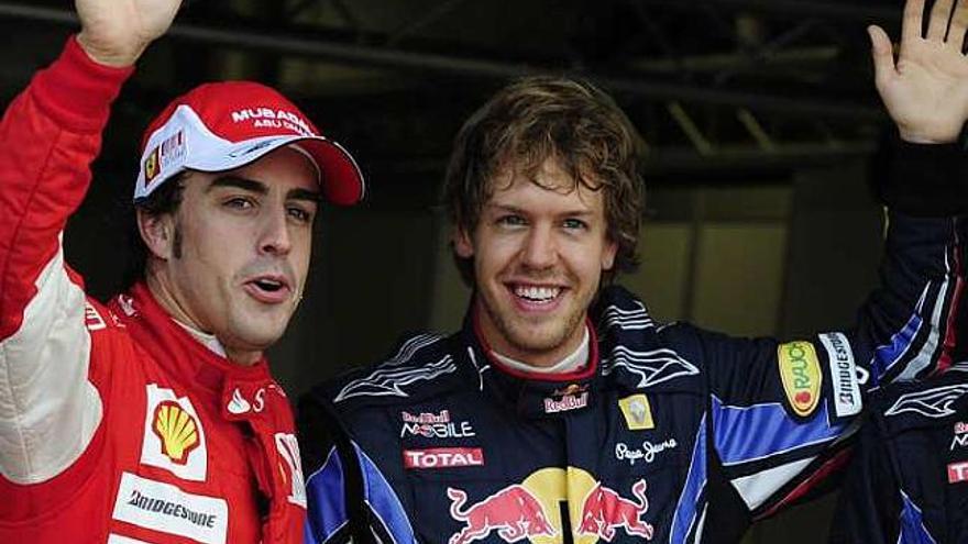 Alonso y Vettel, ayer tras la sesión de clasificación.