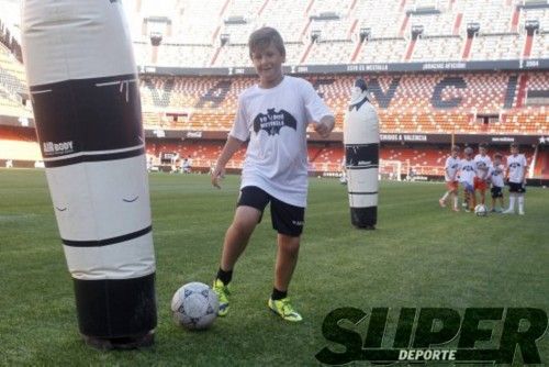 Rubén Baraja y Juan Sánchez, con los más pequeños