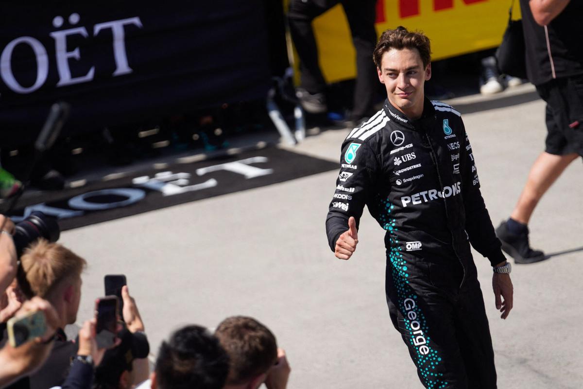 Mercedes' British driver George Russell gives a thumbs up after winning the 2025 Formula 1 Grand Prix du Canada at Circuit Gilles-Villeneuve in Montreal, Canada, on June 15, 2025. (Photo by Geoff Robins / AFP)