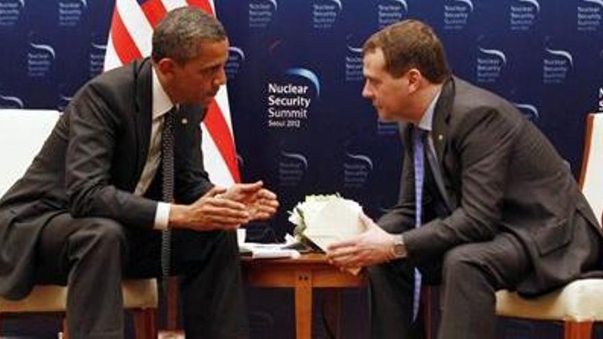 Obama, junto a Medvedev.