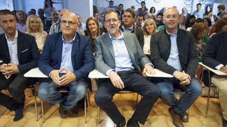 Pablo Pérez, Baltar, Rajoy y Tellado, en la reunión del PPOU. // B.L.