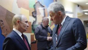 El presidente ruso Vladimir Putin y el portavoz del Kremlin Dmitri Peskov