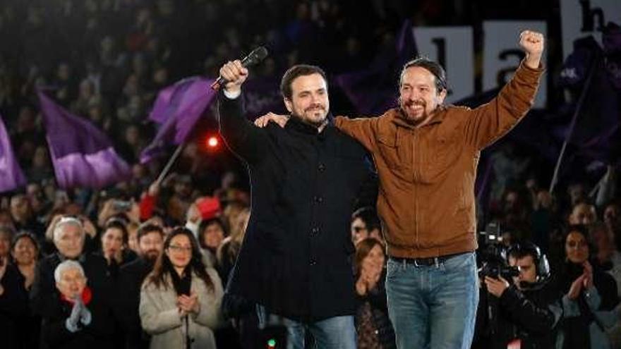 Alberto Garzón y Pablo Iglesias, ayer en Madrid. // Efe