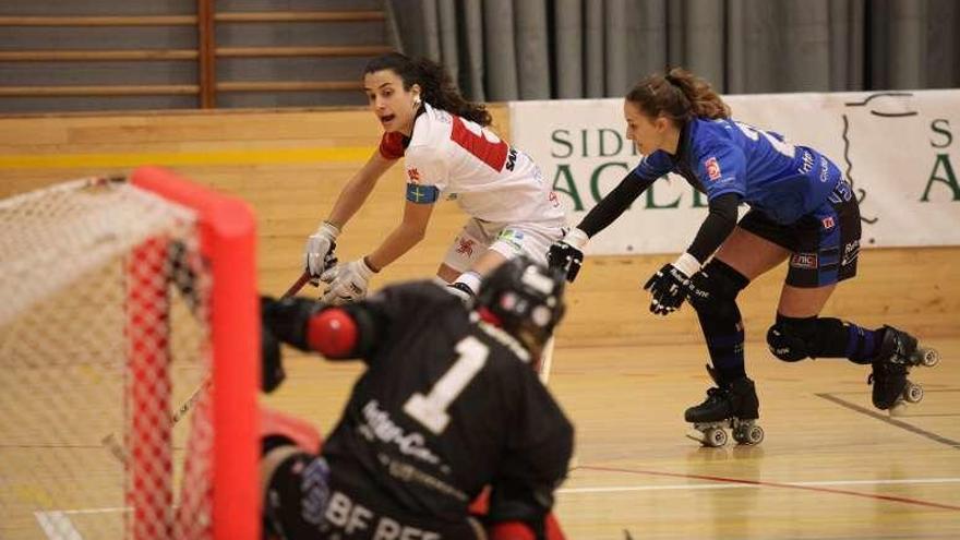 Sara González conduce la pelota ante la presión de una jugadora del Girona durante el partido de ayer en el Mata-Jove.