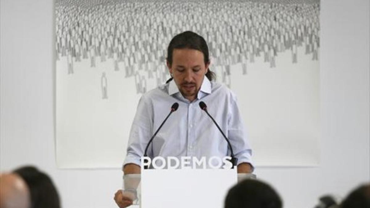 El secretario general de Podemos, Pablo Iglesias, en su comparecencia de prensa en la sede del partido, ayer en Madrid.