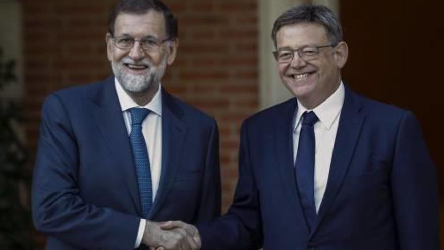 Ximo Puig junto al presidente del Gobierno, Mariano Rajoy, durante su última reunión en Madrid.