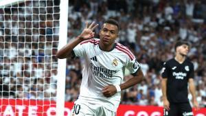 MADRID, 26/08/2026.- El delantero francés del Real Madrid Kylian Mbappé celebra su tercer gol durante el encuentro correspondiente a la primera jornada de LaLiga que Real Madrid y Real Sociedad disputan este miércoles en el Santiago Bernabéu, en Madrid. EFE/ Kiko Huesca