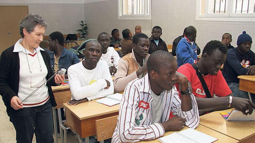 Inmigrantes de origen senegalés participan en un taller de formación.  // Iñaki Osorio