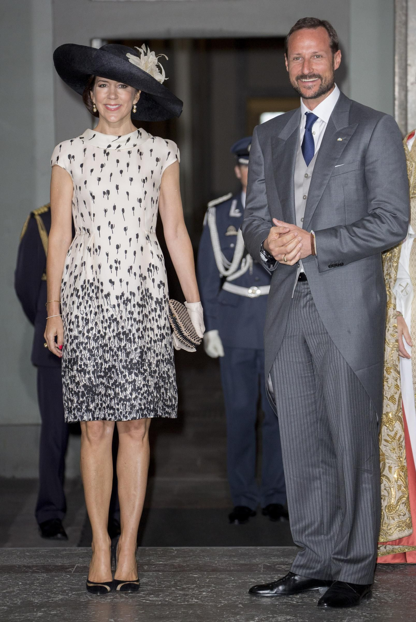 Mary Donaldson y Haakon de Noruega en el bautizo del príncipe Oscar de Suecia