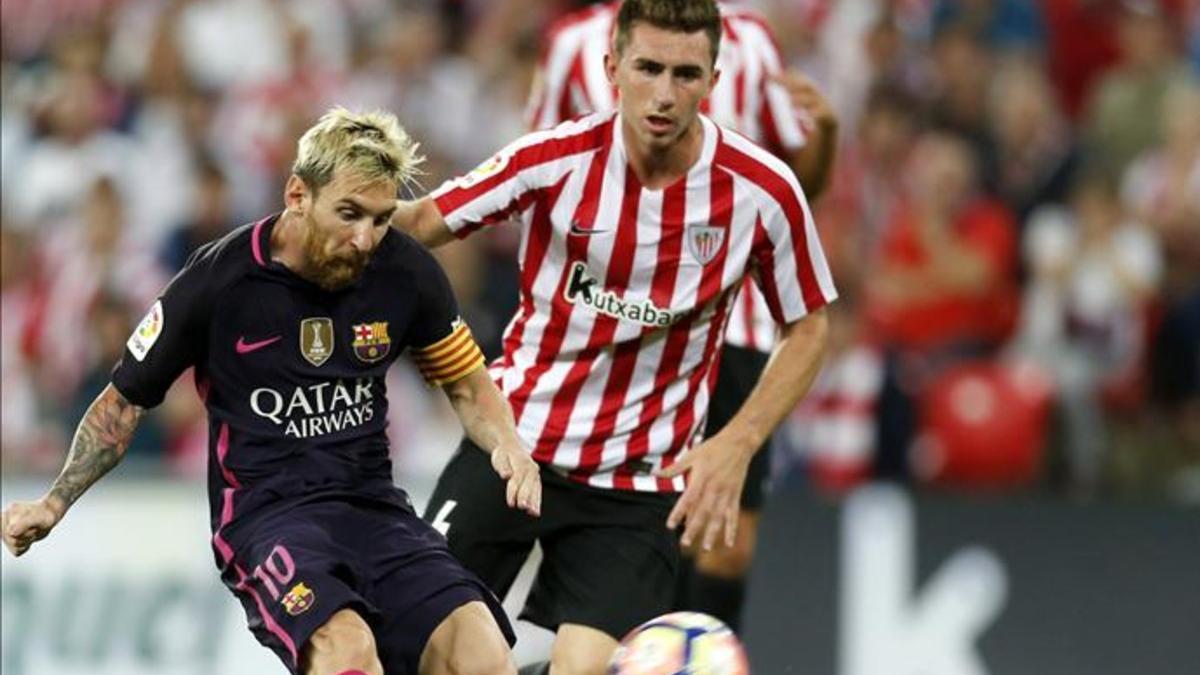 Laporte, con Messi, en el Athletic-FC Barcelona del pasado 28 de agosto