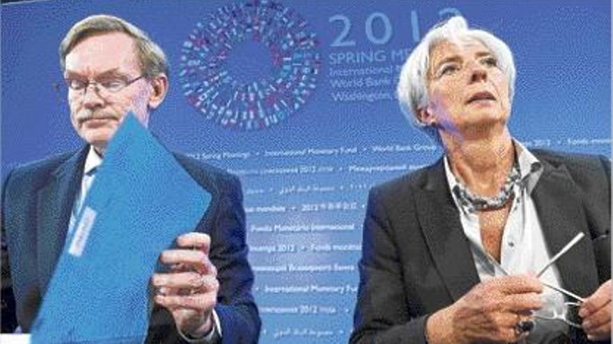 Robert Zoellick (Banco Mundial) y Christine Lagarde (FMI), ayer, en Washington.