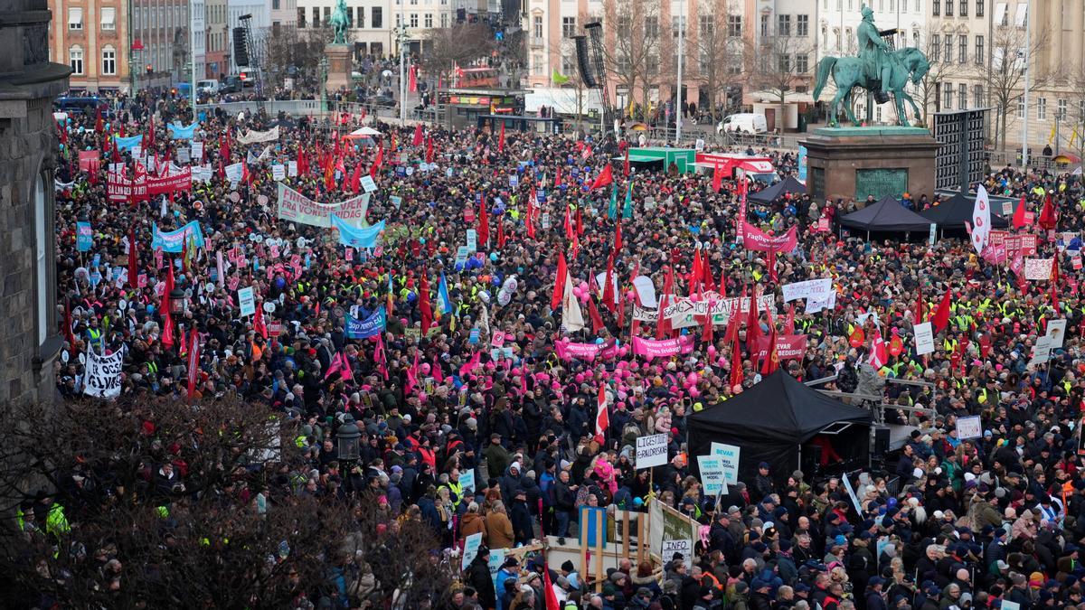 Protest in front of the Danish Parliament in Copenhagen Demonstrators take part in a protest against the government's proposal to abolish a public holiday to help finance the defence budget, in front of the Danish Parliament in Copenhagen, Denmark, February 5, 2023. The Ritzau Scanpix/Emil Helms via REUTERS