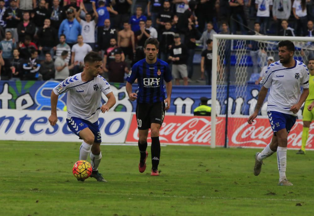 JORNADA 15 -TENERIFE 1 - GIRONA 1 . Un empat amb molt de valor El Girona puntua a Tenerife després de jugar més de mitja hora amb un de menys per l'evitable expulsió de Javi Álamo, que veu dues grogues a l'inici de la segona part · Els gironins pateixen en els primers minuts però Pablo Machín rectifica i amb l'equip jugant amb una defensa de quatre millora molt, tant amb onze com amb deu jugadors