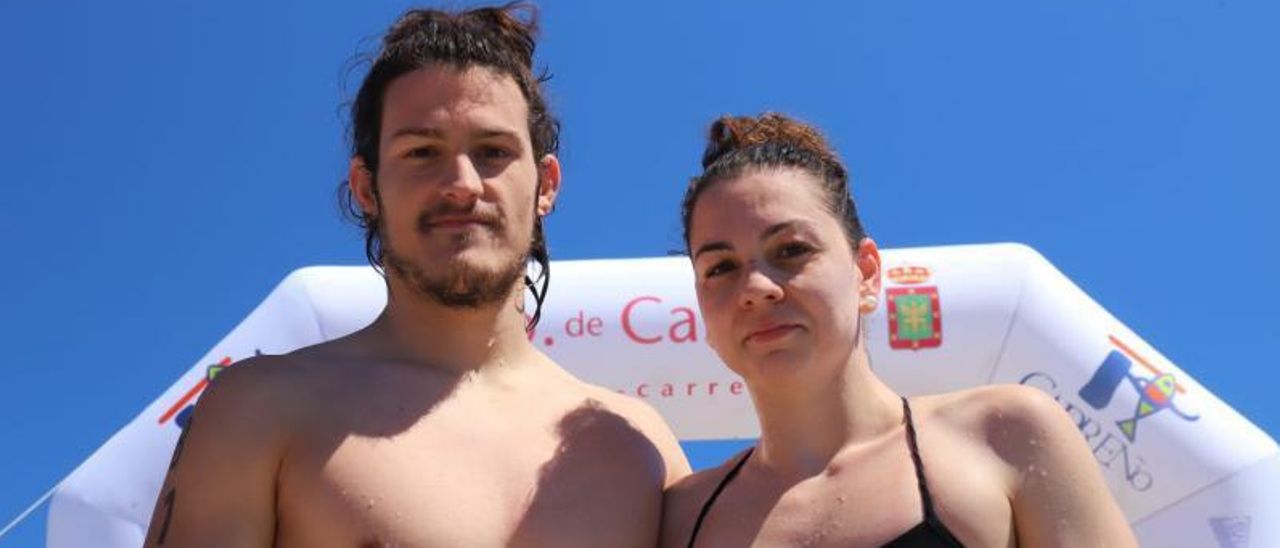 Lucas Costa y Alba Ortiz de Guinea, ayer, tras ganar en Candás.