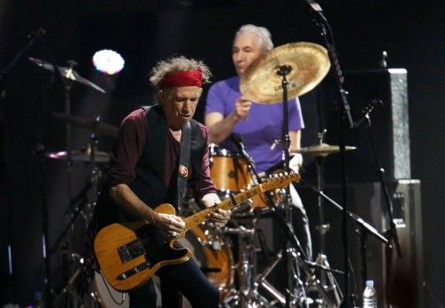 Keith Richards (L) and Charlie Watts of the Rolling Stones perform during the "12-12-12" benefit concert for victims of Superstorm Sandy at Madison Square Garden in New York