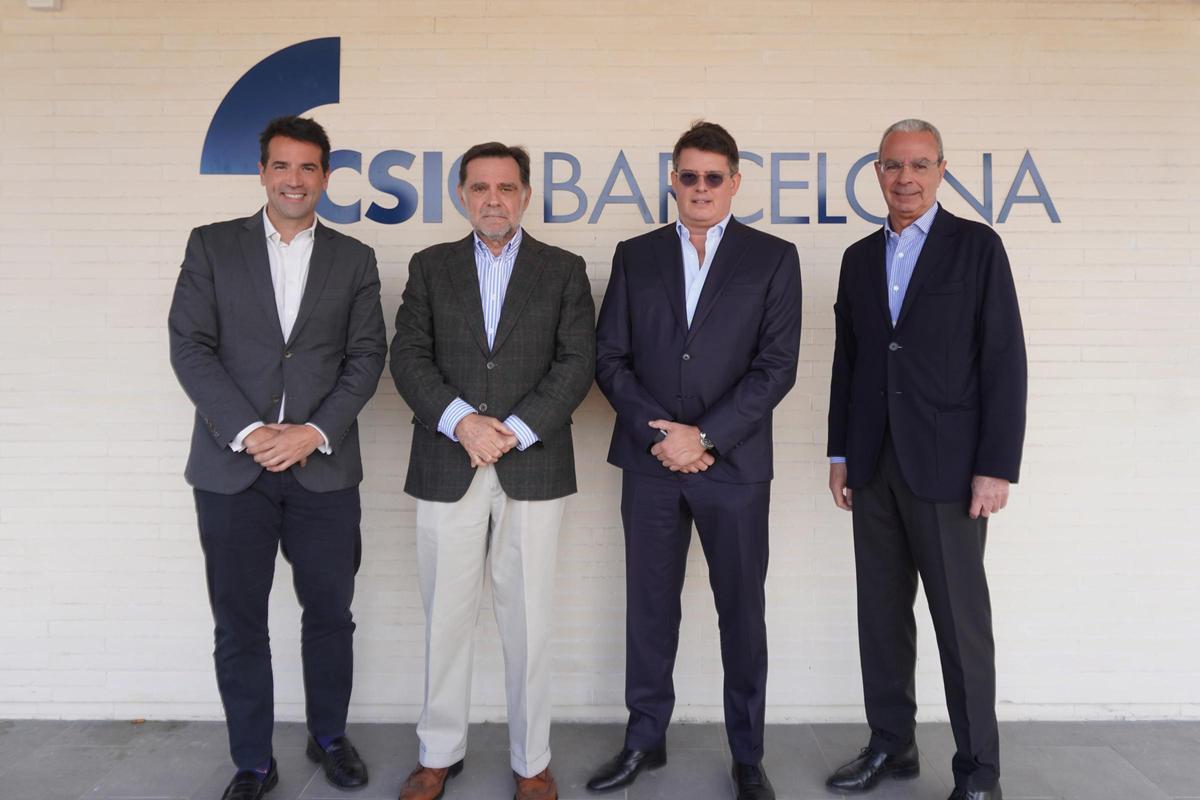 Imagen del acto de la firma del acuerdo entre CSIO y Tennium