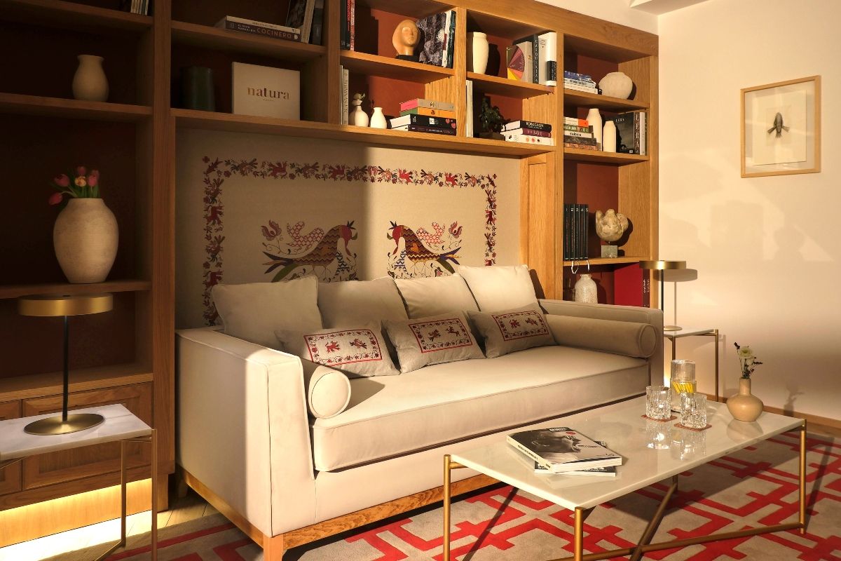 La biblioteca con numerosos libros de gastronomía.