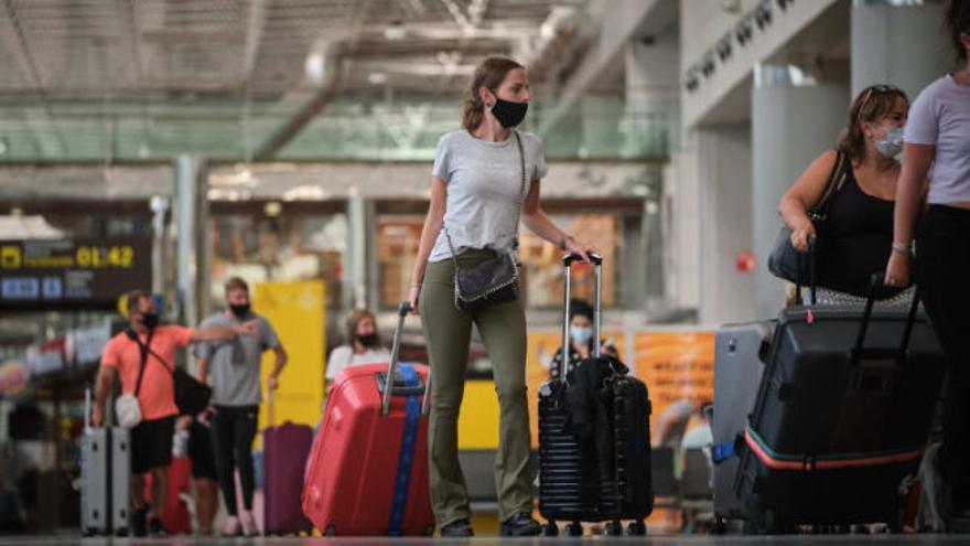 Turistas en el aeropuerto del Sur.