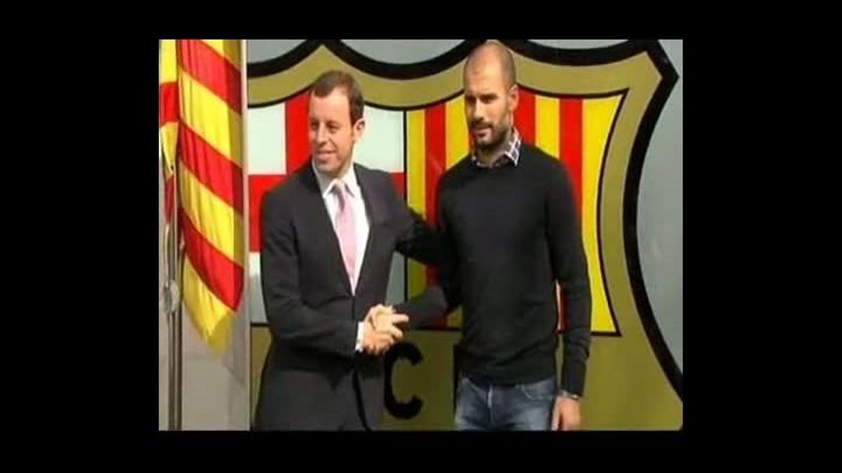 Encaixada de mans de Rosell i Guardiola.