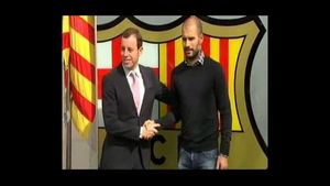 Encaixada de mans de Rosell i Guardiola.