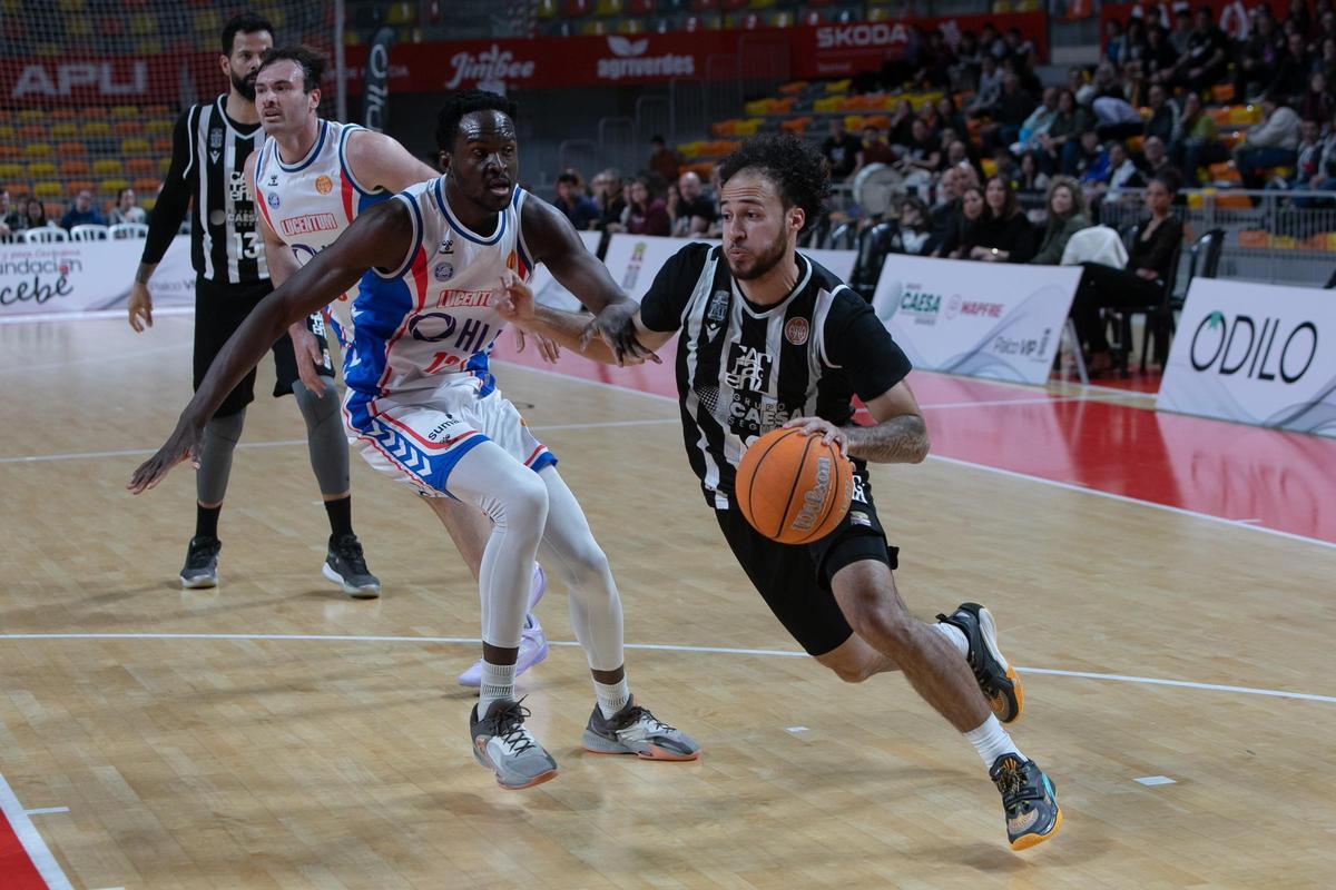 Un momento del partido entre el Caesa Cartagena y HLA Alicante disputado en el Palacio.