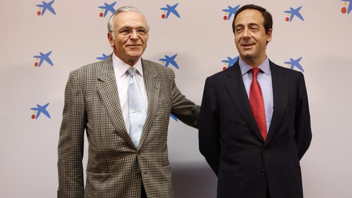 El presidente de CaixaBank, Isidre Fainé (izquierda), junto a Gonzalo Gortázar, consejero delegado de la entidad.