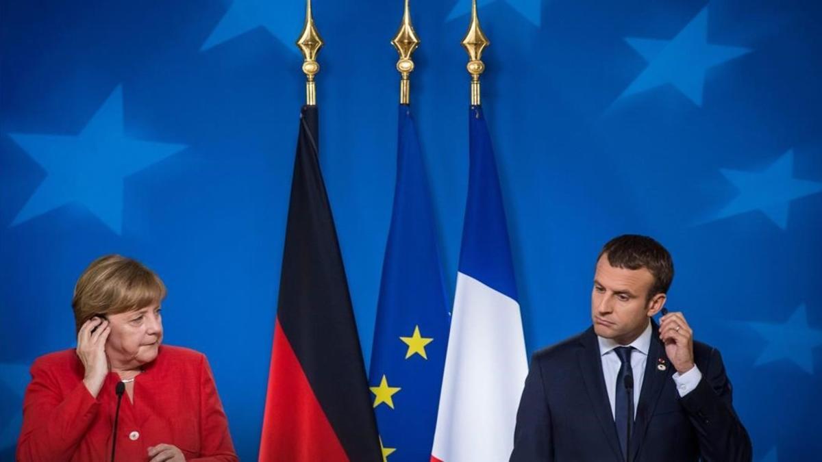 Angela Merkel y Emmanuel Macron.