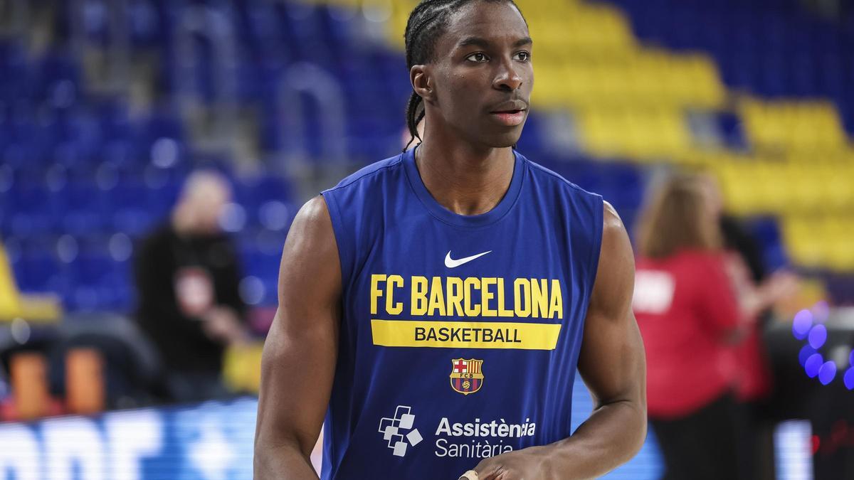 Dame Sarr, en un calentamiento con el Barça.