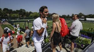 lmendiola48855742 switzerland s roger federer walks back after a practice sess190629193703