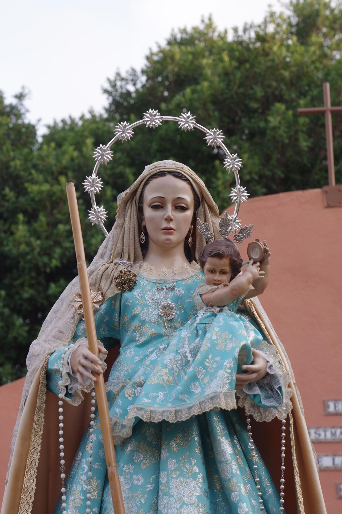 Las mejores imágenes del rosario con antorcha de la Santísima Virgen de las Cañas, en el Puerto de la Torre