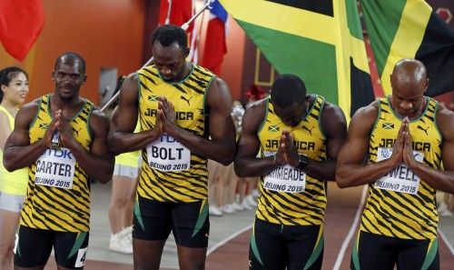 Jamaica's team Carter, Bolt, Ashmeade and Powell arrive to compete in the men's 4 x 100 metres relay final during the 15th IAAF World Championships at the National Stadium in Beijing