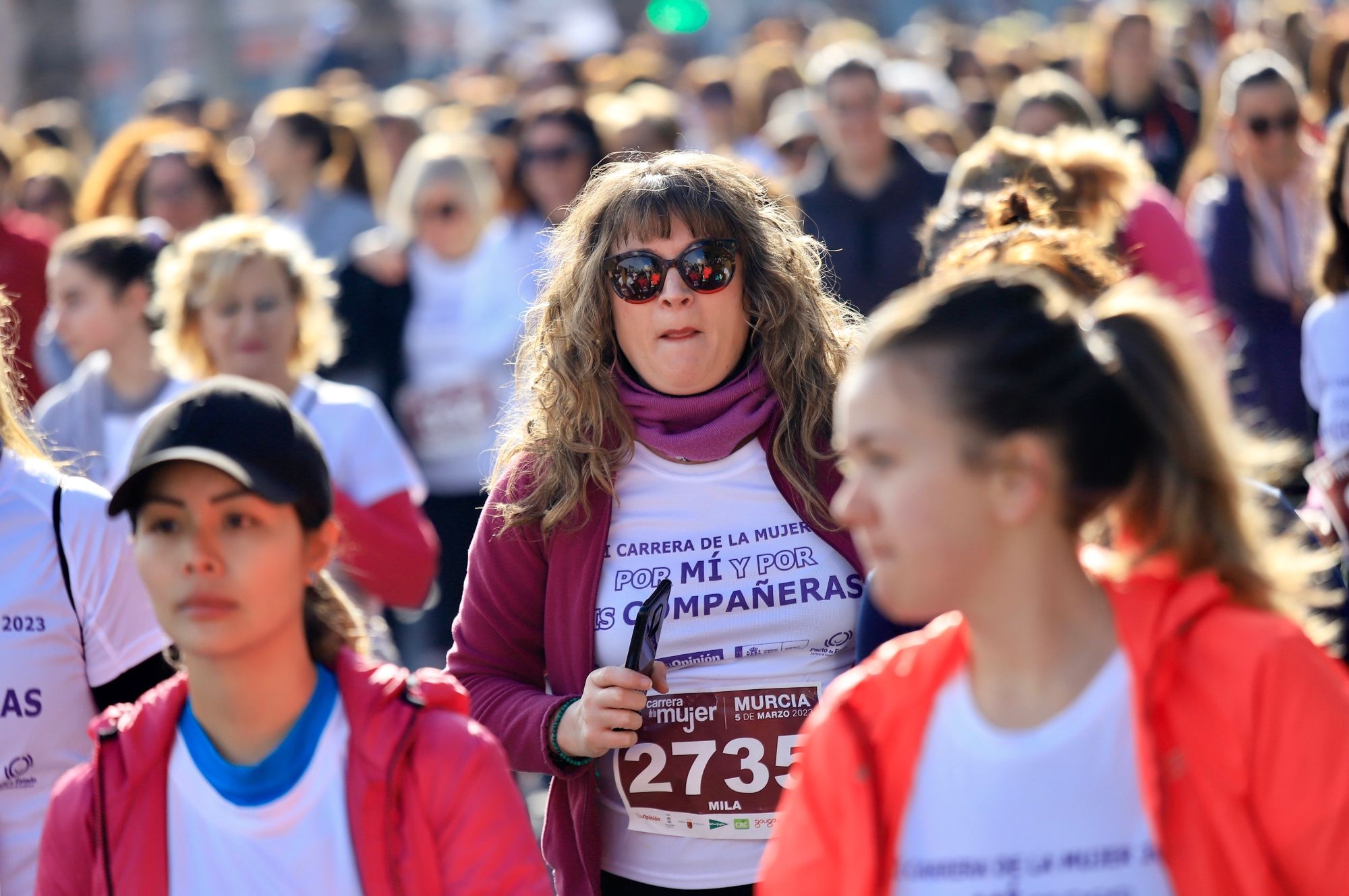 La salida y el recorrido de la Carrera de la Mujer 'inmortalizados' en imágenes