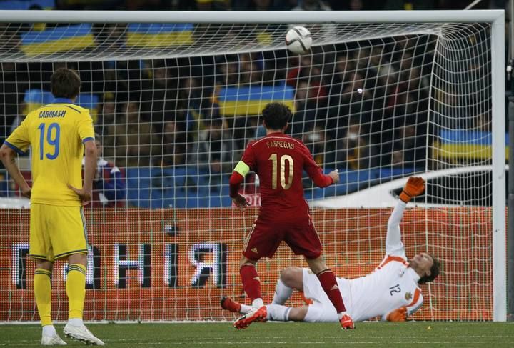 Ukraine's goalkeeper Pyatov makes a save after a penalty kick by Spain's Fabregas during their Euro 2016 group C qualifying soccer match at the Olympic stadium in Kiev, Ukraine