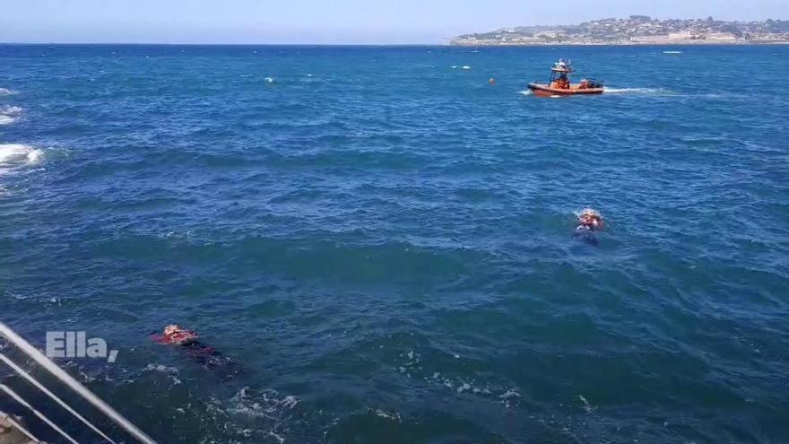Rescate Gijón: Angustiosa búsqueda en la playa de San Lorenzo de un bañista de 19 años