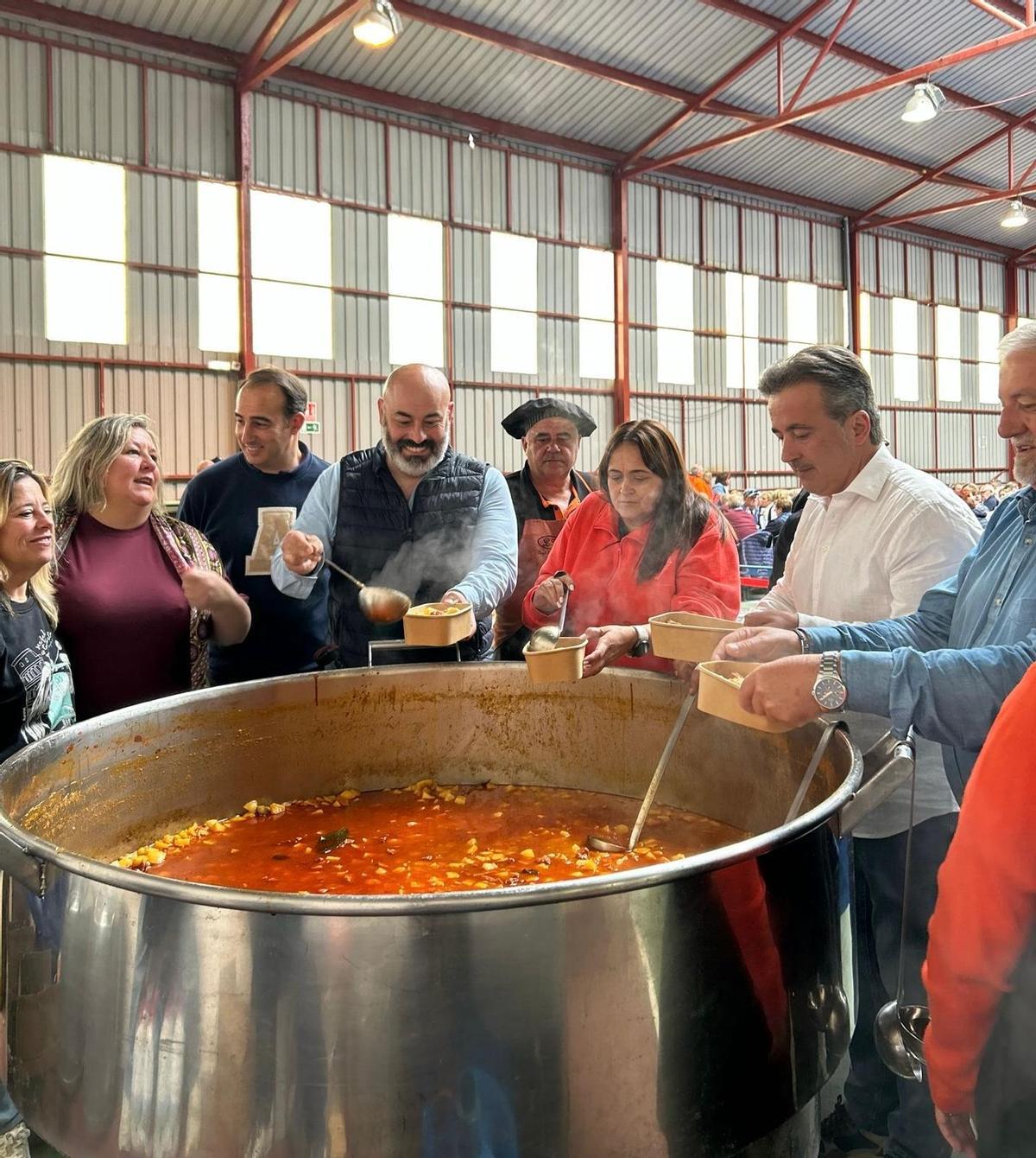 La preparación de la comida, con los dos alcaldes.