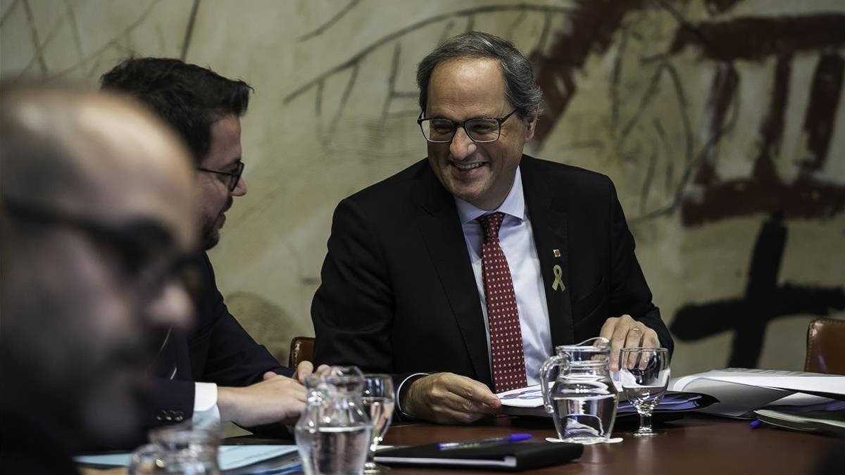 El president Quim Torra se muestra sonriente al inicio del Consell Executiu.